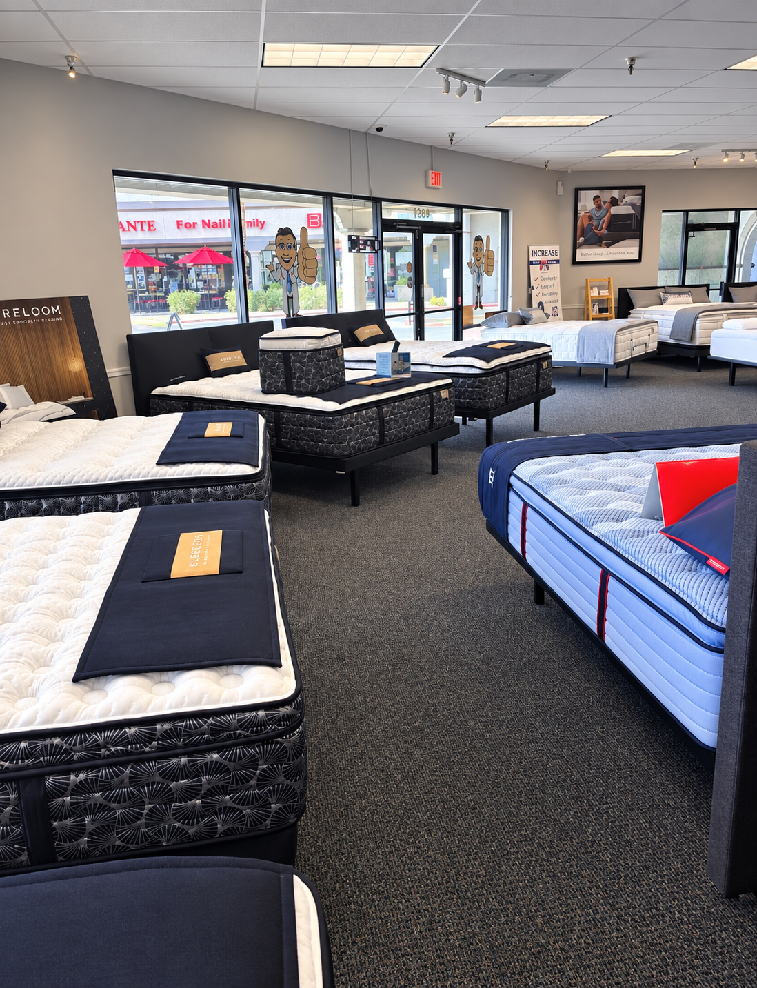 Bed DRS Scottsdale showroom with rows of premium mattresses